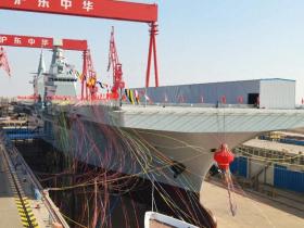 中国首艘076型舰顺利下水,电磁弹射引领世界